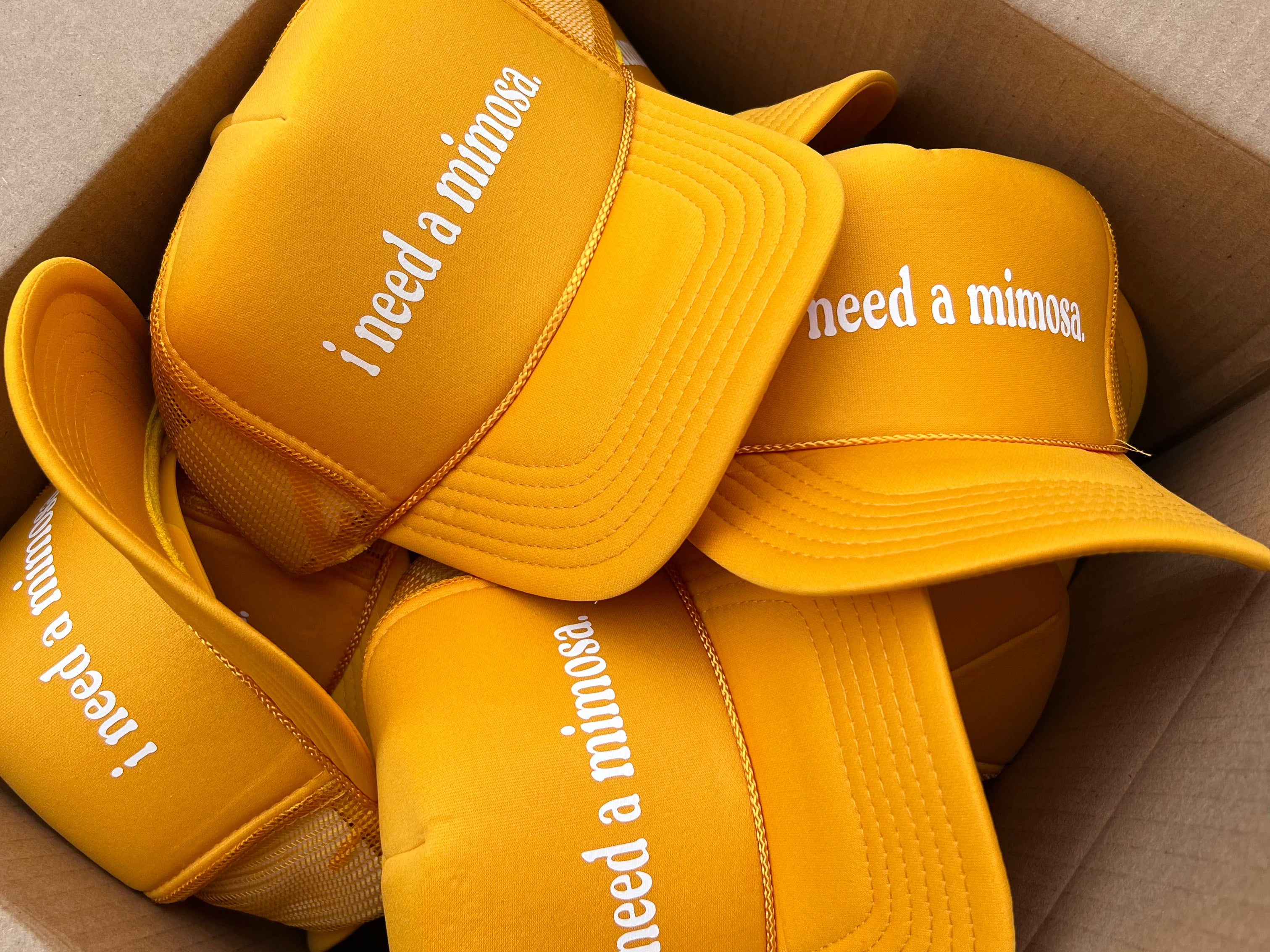 i-need-a-mimosa-trucker-hat.jpg
